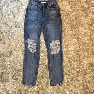 Dark blue distressed jeans